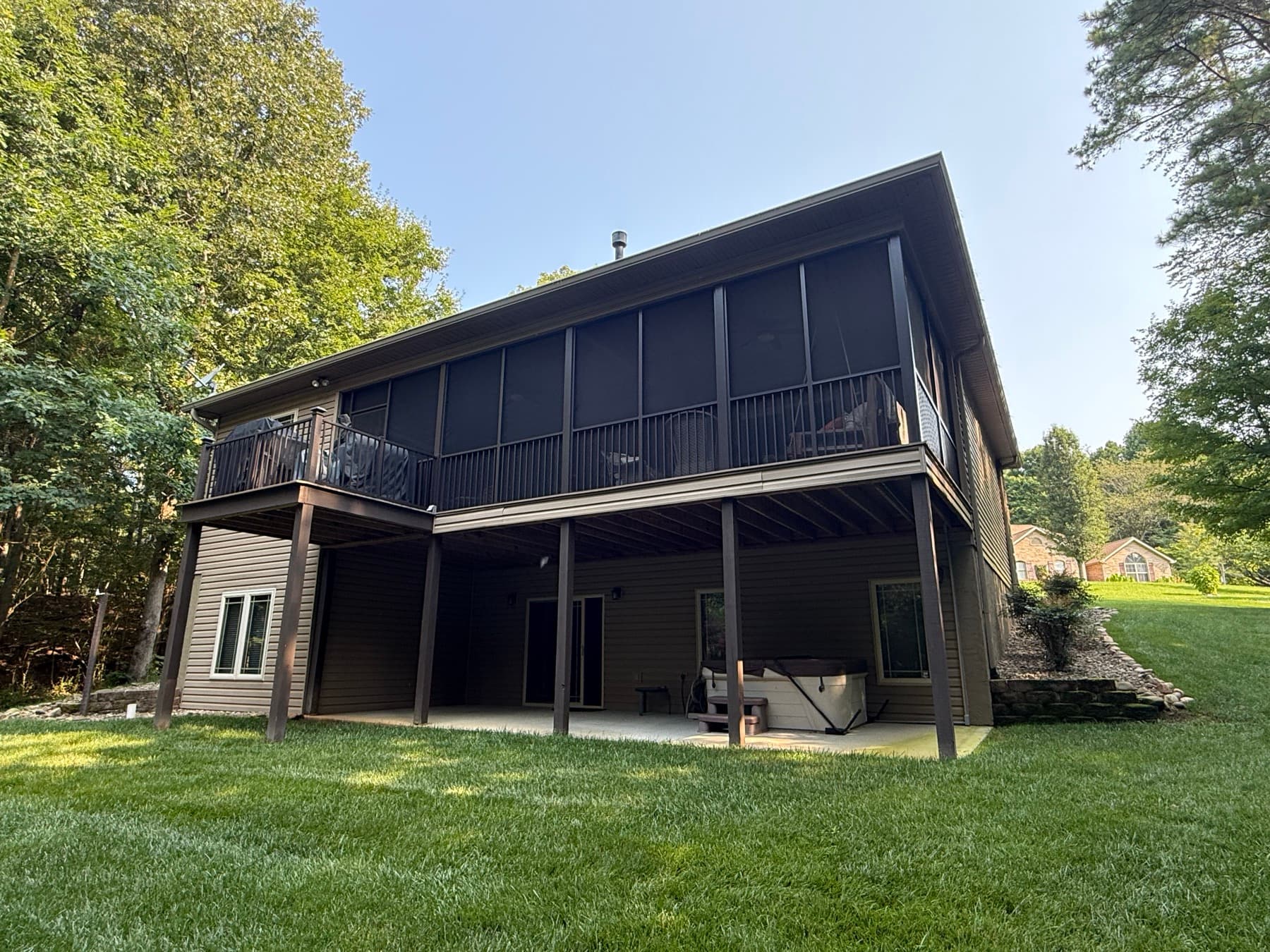 Completed screened porch and adjoining elevated deck